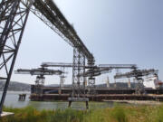 A grain ship loads at the EGT terminal at the Port of Longview.