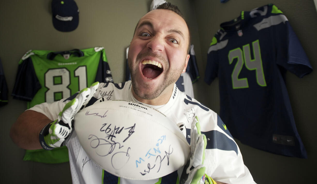 Seattle Seahawks fan Roger Binns got his first set of season tickets this year.