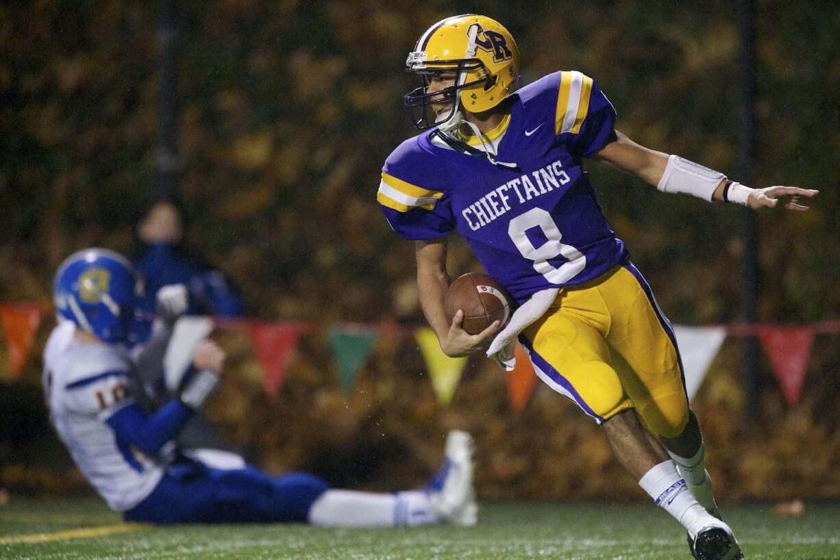 Columbia River's Terrell Bolton (8) leaves a Bainbridge defender behind after catching a touchdown pass from Clayton Frank during the third quarter Friday at Kiggins Bowl.