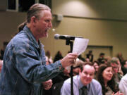 Henry Washburn, of Vancouver, shares his experiences with marijuana during a public forum before the state's Liquor Control Board that took place Thursday evening at Clark College's Gaiser Hall in Vancouver.