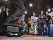 An exhibitor demonstrates a Solowheel at the 2012 International Consumer Electronics Show in Las Vegas.