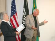 Salmon Creek: Bill Allman, a founding member of the Washington State Veterans Employee Resource Group, laughs it up while receiving a certificate of appreciation from Alfie Alvarado-Ramos, director of the Washington Department of Veterans Affairs.