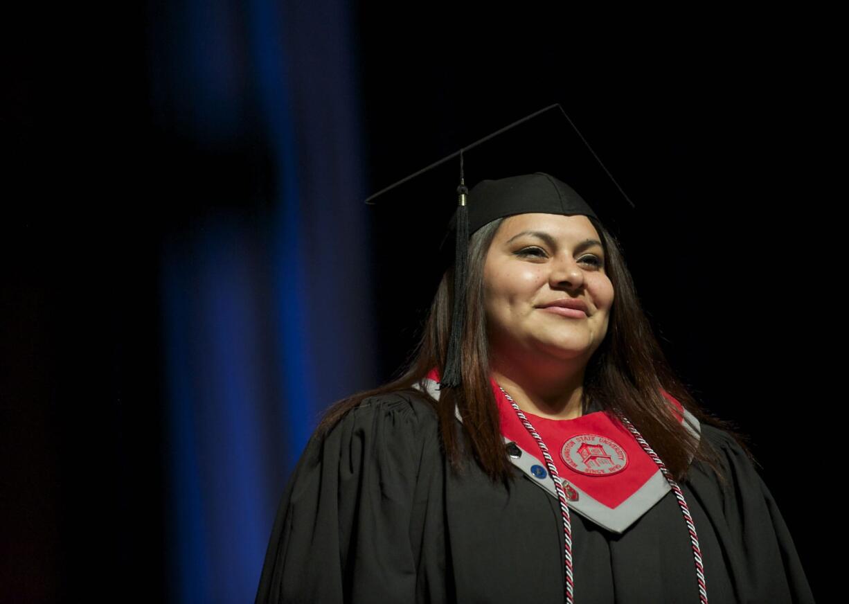 Monica Santos-Pinacho receives the Chancellor's Award for Student Achievement during the WSUV graduation ceremony at the Sleep Country Amphitheater on Saturday.