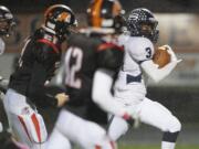 Skyview's Daniel Thompson carries the ball for a touchdown against Battle Ground, Friday, at District Stadium in Battle Ground.