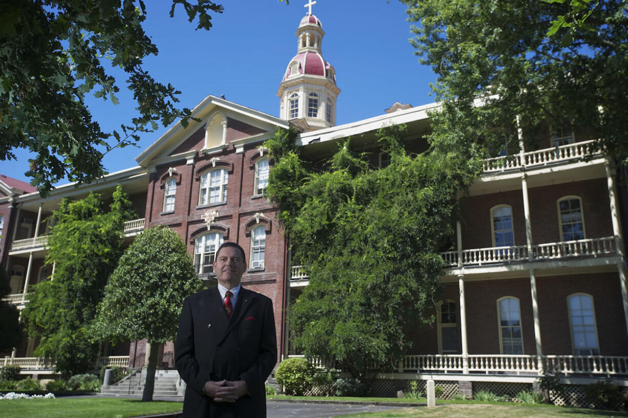 Elson Strahan, president and chief executive officer of the Fort Vancouver National Trust, sees Vancouver's historic Academy, pictured above, as having a symbiotic relationship with the West Barracks managed by the trust.