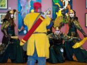 These Kumoricon players from Salem, Ore., dressed as Kyoshi Warriors from the Nickelodeon series &quot;Avatar: The Last Airbender,&quot; were repeatedly asked to pose Sunday.