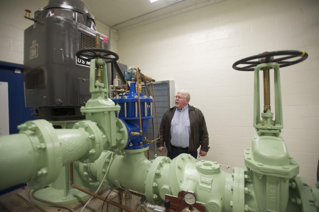 Steve Prather, Water Quality and Production Manager at Clark Public Utilities, shows a well pump house near Fruit Valley Road, Friday, November 9, 2012.