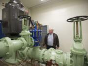 Steve Prather, Water Quality and Production Manager at Clark Public Utilities, shows a well pump house near Fruit Valley Road, Friday, November 9, 2012.