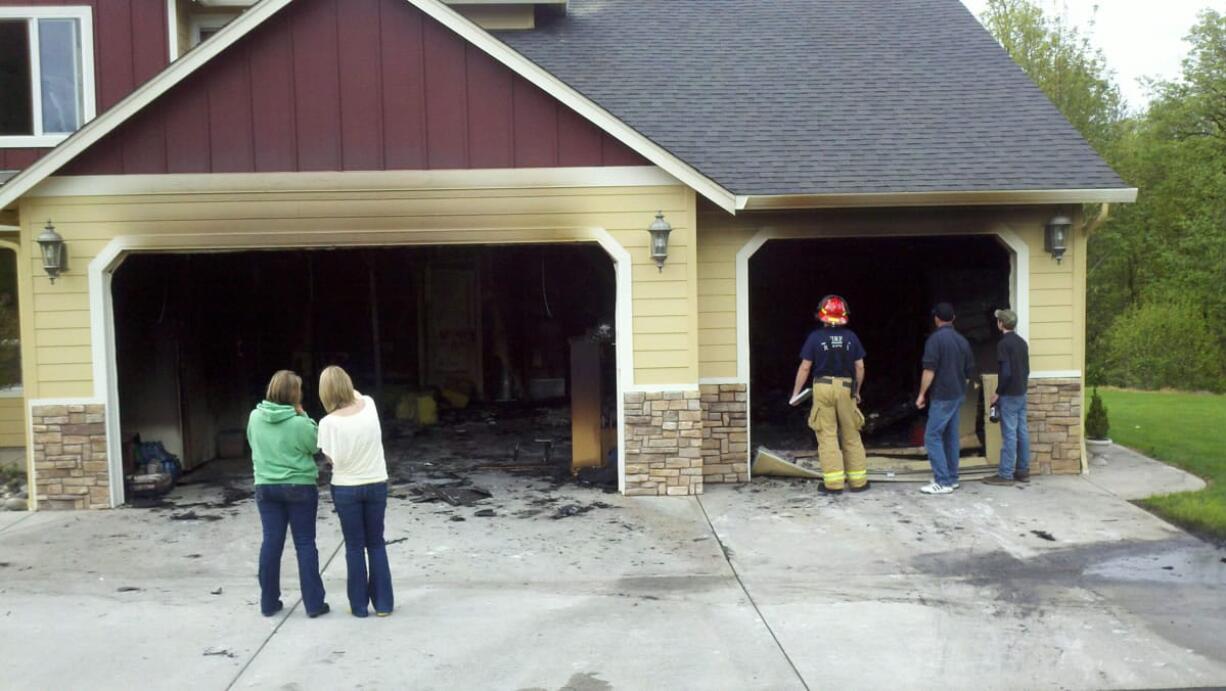 Battalion Chief Tim Dawdy/Clark County Fire and Rescue 
 A sprinkler system is credited for confining damage to the garage of this Ridgefield house when fire broke out with nobody home in April 2012.