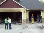 Battalion Chief Tim Dawdy/Clark County Fire and Rescue 
 A sprinkler system is credited for confining damage to the garage of this Ridgefield house when fire broke out with nobody home in April 2012.