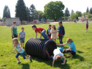 Washougal: Tracey Stinchfield, right, tries to make exercise fun for the nearly 150 Washougal elementary school students enrolled in her new running club, a six-week program offered through Washougal Community Education and Recreation.