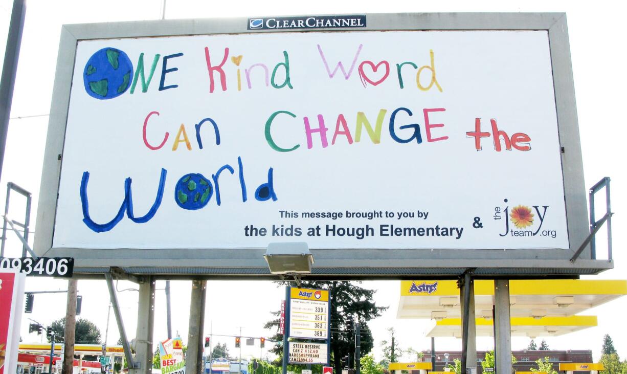 Hough: Hough Elementary School students and The Joy Team are helping spread positive messages in a recent campaign, which includes this billboard at 1405 N.