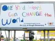 Hough: Hough Elementary School students and The Joy Team are helping spread positive messages in a recent campaign, which includes this billboard at 1405 N.