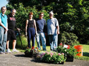 Mount Vista: Marianne Beck, from left, Michael Bayautet, Fran Richter, Doug Richter and Rick Stellfox helped out with a neighbor's property July 7.