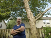 Anne Bonney wants the London planes that surround Indian Hills Condominiums removed because they inflame her allergies.