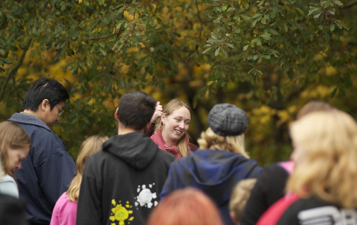 Lauriel Schuman leads a guided mushroom scavenger hunt hike on Saturday at Columbia Springs' family field-trip day.