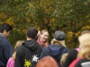 Lauriel Schuman leads a guided mushroom scavenger hunt hike on Saturday at Columbia Springs' family field-trip day.