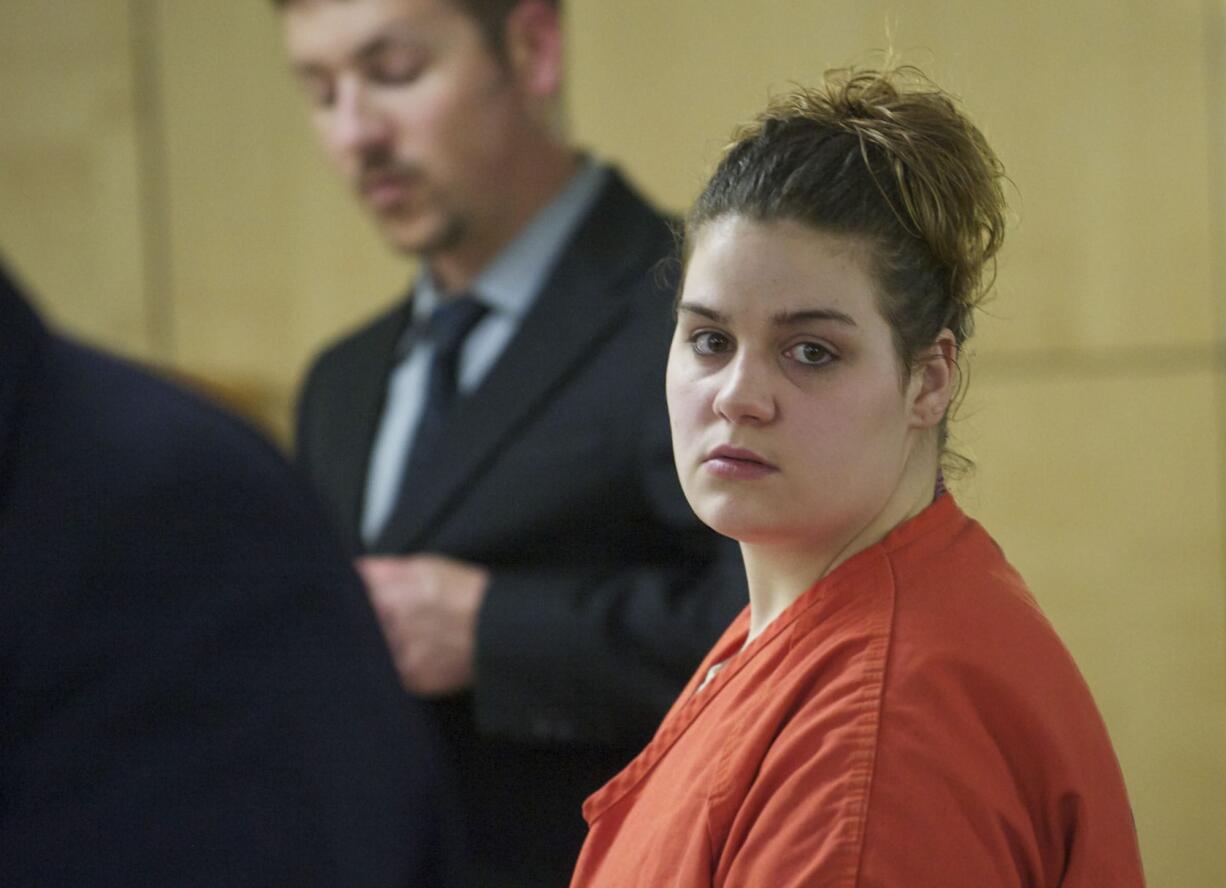 Joanna Speaks is processed in Clark County arraignment court on July 10 after pleading guilty to charges related to a robbery and attempted murder last year of an Oregon man.