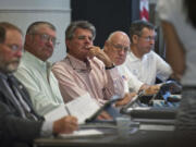 Ridgefield City Council members, from left, Darren Wertz, Lee Wells, Mayor Ron Onslow, David Taylor and Don Stose listen to a resident speak about a proposed dog park during an Aug. 9 meeting.