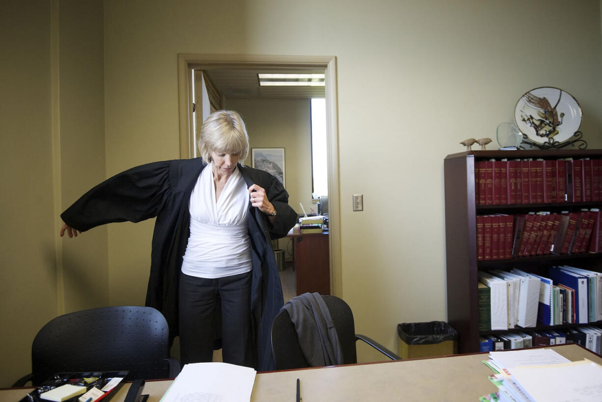 Clark County Judge Barbara Johnson prepares for an afternoon court session this past week. Johnson was the first woman judge in Clark County when she took office in 1987.