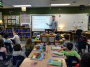 Ridgefield: Nathan Ingroum teaches his South Ridge Elementary School first-grade class the significance of Memorial Day before the holiday.