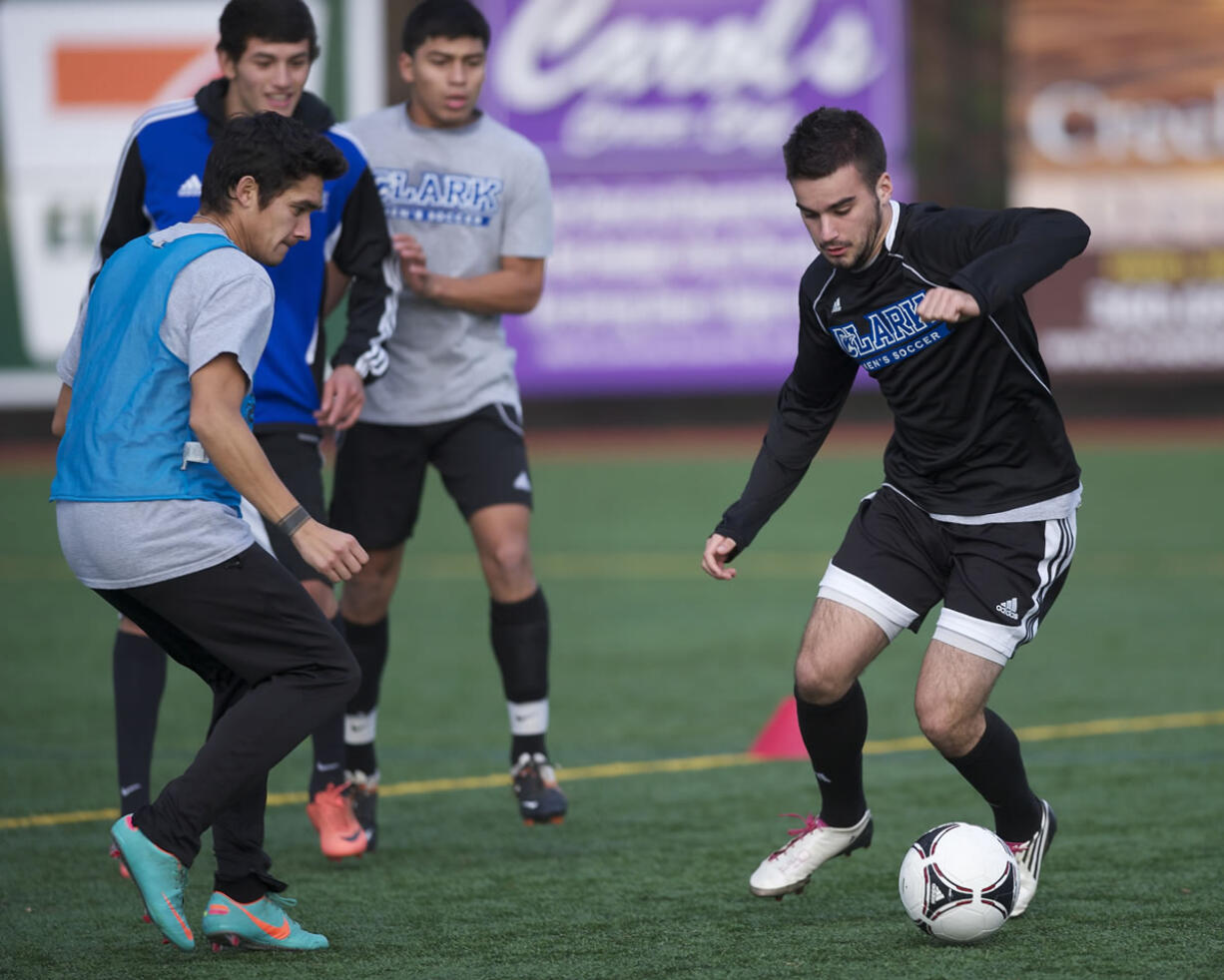 Clark College standouts Bryanth Garcia-Junco, left, 22, and Sascha Pell, right, 18, practice at Luke Jensen Sports Park on Thursday November 8, 2012.