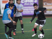 Clark College standouts Bryanth Garcia-Junco, left, 22, and Sascha Pell, right, 18, practice at Luke Jensen Sports Park on Thursday November 8, 2012.