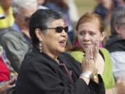 American Indian artist Lillian Pitt designed the Land Bridge welcome gate and other site artwork. &quot;Let the welcome gate take you through to the village,&quot; Pitt told those who attended the celebration.