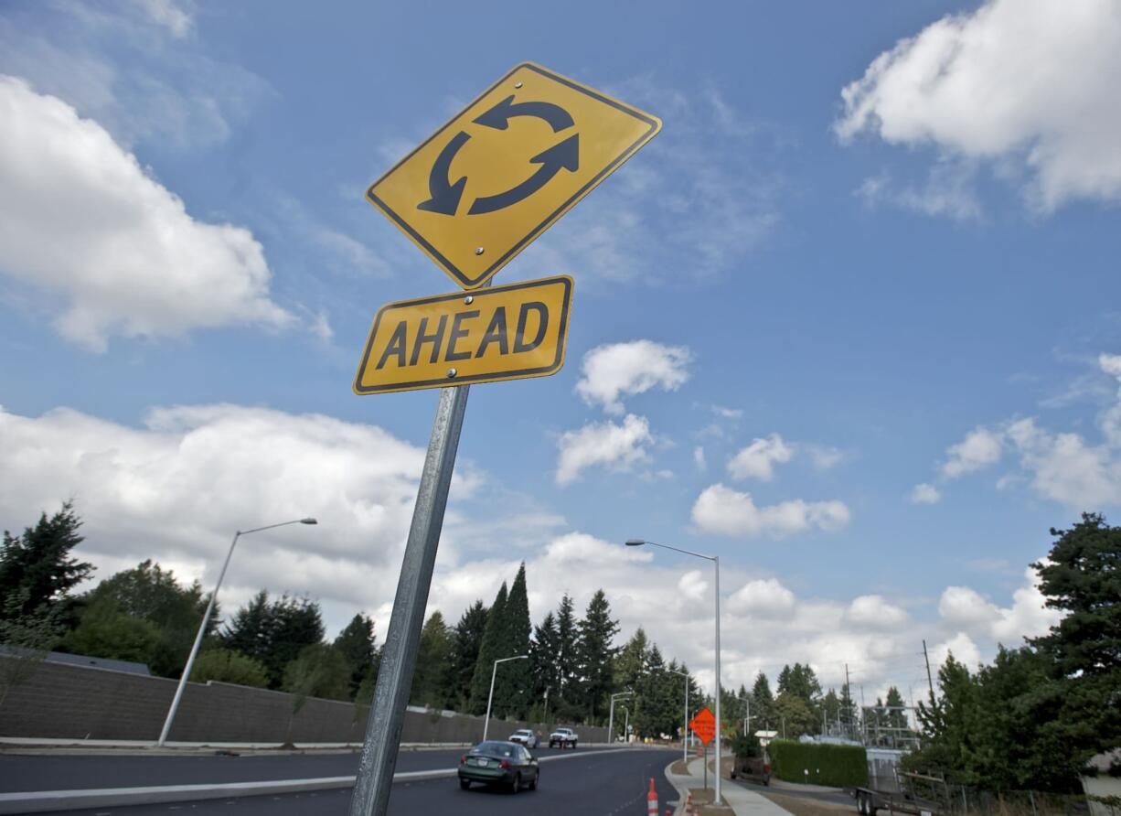 The $14.6 million reconstruction of Northeast 137th/138th Avenue includes the addition of roundabouts and a concrete median, which were added to address neighbors' concerns about making left turns.