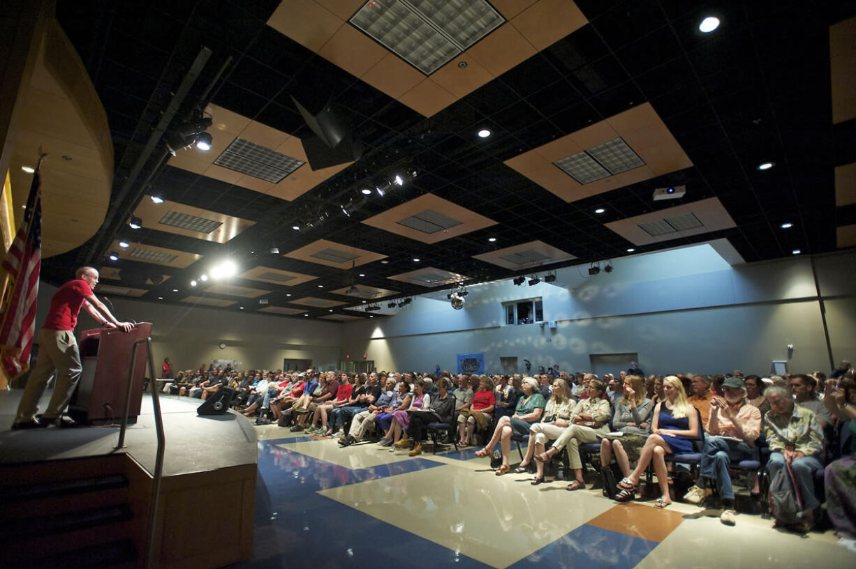 Environmentalist Bill McKibben speaks to about 400 Wednesday at Clark College.