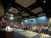 Environmentalist Bill McKibben speaks to about 400 Wednesday at Clark College.