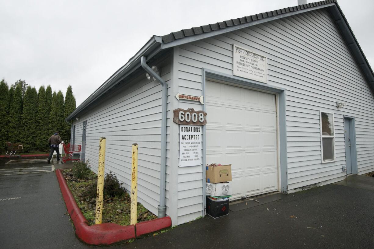 F.I.S.H of Orchards uses a small building on Northeast 110th Avenue as a food bank. It's so small, fire rules permit only five clients inside at a time, and sometimes the line of people waiting stretches across the parking lot in the cold and rain.