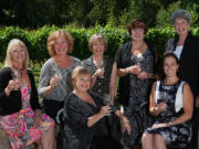 Grape-ful Women formed in May 2012 as a way for local women, and some men, to get together, enjoy wine and plan charity events. Back row: Lynda Lathrop, from left, Janine Julian, Linda Anderson, Meghan Guinn and Charlotte Bruce.