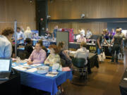 Local employers meet with students at a Youth Summer Jobs Fair on Friday at the Vancouver Community Library.