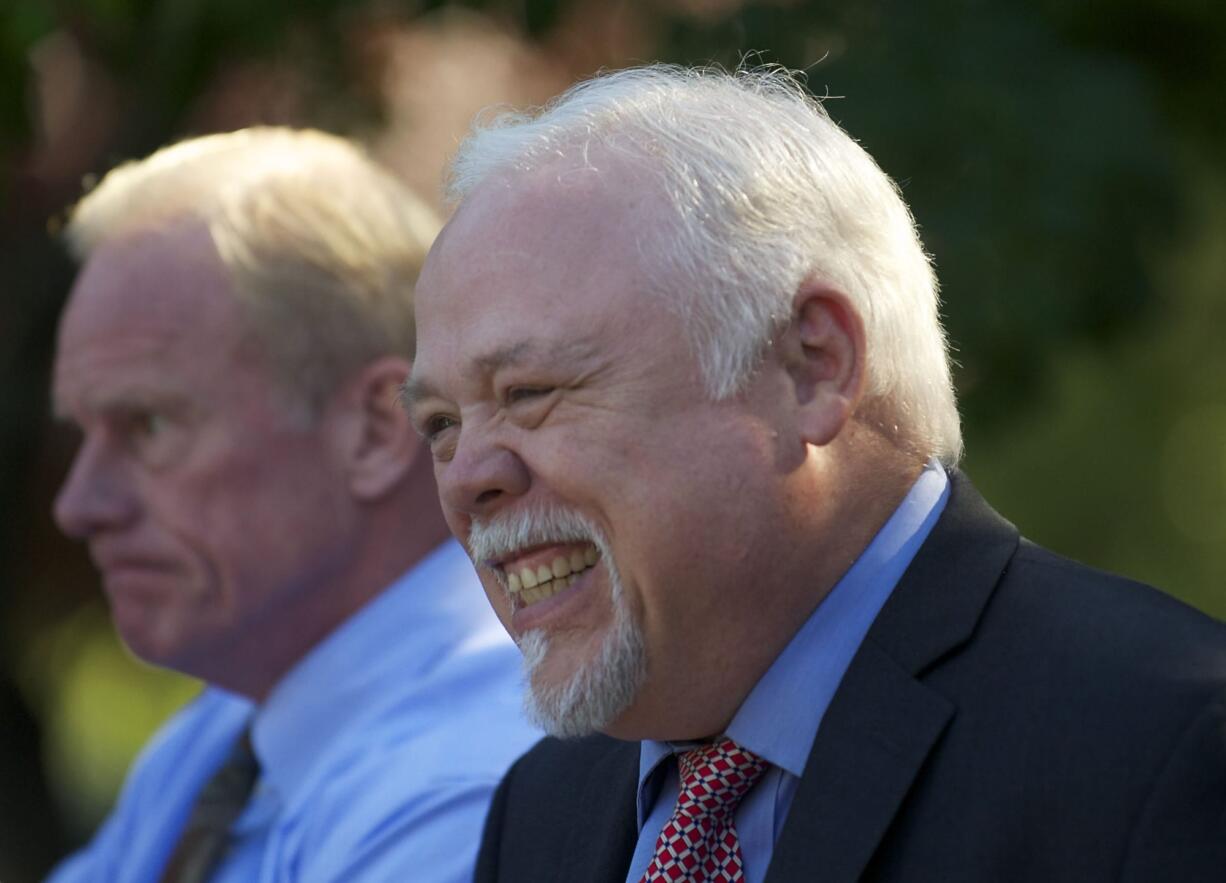 State Sen. Don Benton, front, and  State Rep.