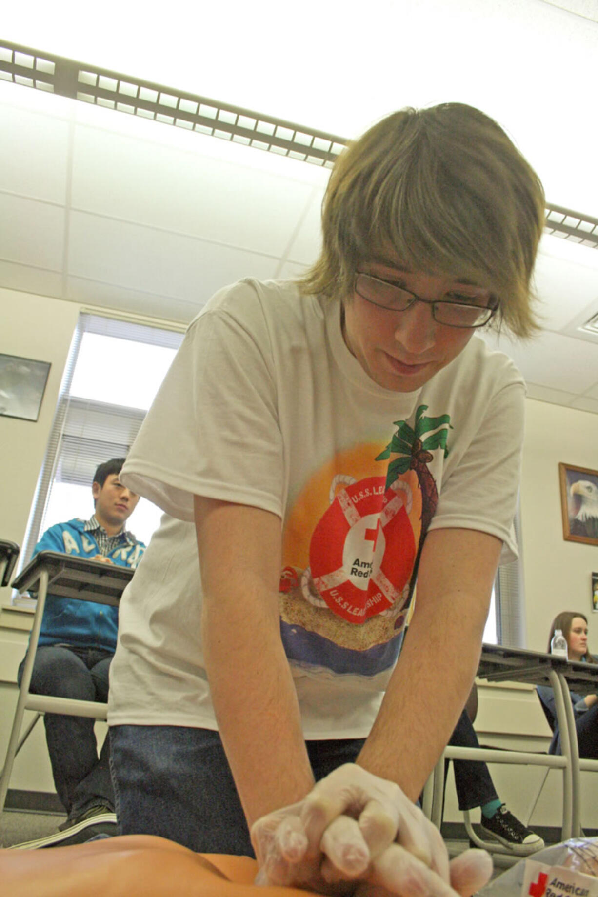 Camas: Alex Switzer, from Union High School, practices CPR during the annual Leadership Development Conference held March 9-10. The Southwest Washington Red Cross Youth Council event had seminars on a variety of topics, including team building, planning and conflict management.