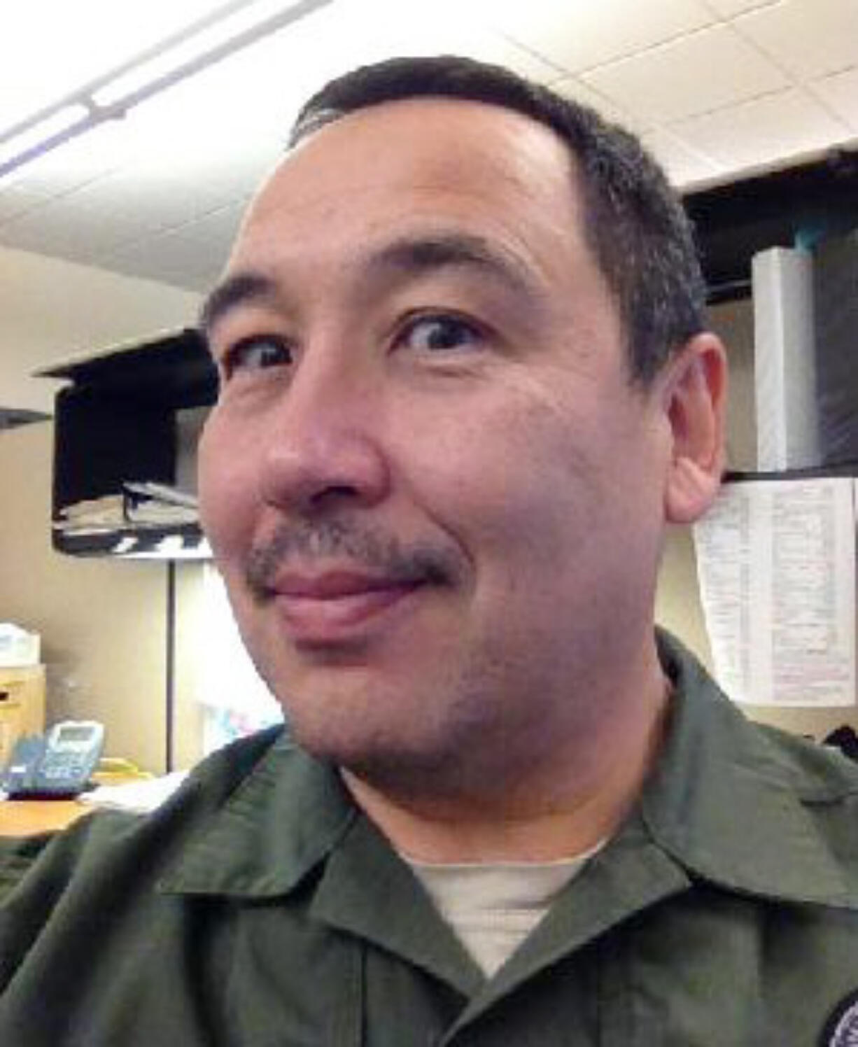 East Precinct: Vancouver Police Officer Cpl. Doug Rickard shows off his fledgling mustache during the second week of growing it in March.