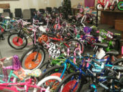 Esther Short: The Children&#039;s Justice Center received a donation of 130 bikes and eight scooters from the Longshoremen of Vancouver International of Union Local No.