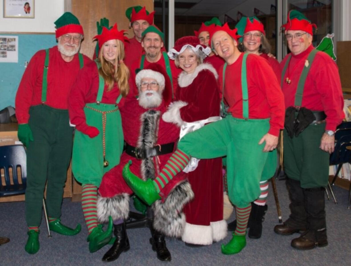 Central Vancouver: Members of the Rotary Club of Vancouver dressed up and brought toys to kindergarten students and first-graders at Roosevelt Elementary School, King Elementary School and Washington Elementary School on Dec.