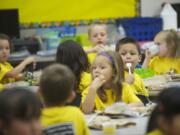 Renee Sutter's kindergarten class enjoys snack time at Harney Elementary School during Jump Start Kindergarten.