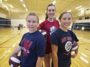 Kings Way volleyball players, from left, Sarah Landstrom, Erin Sprowls and McKenzie Davis at practice, Wednesday, September 12, 2012.