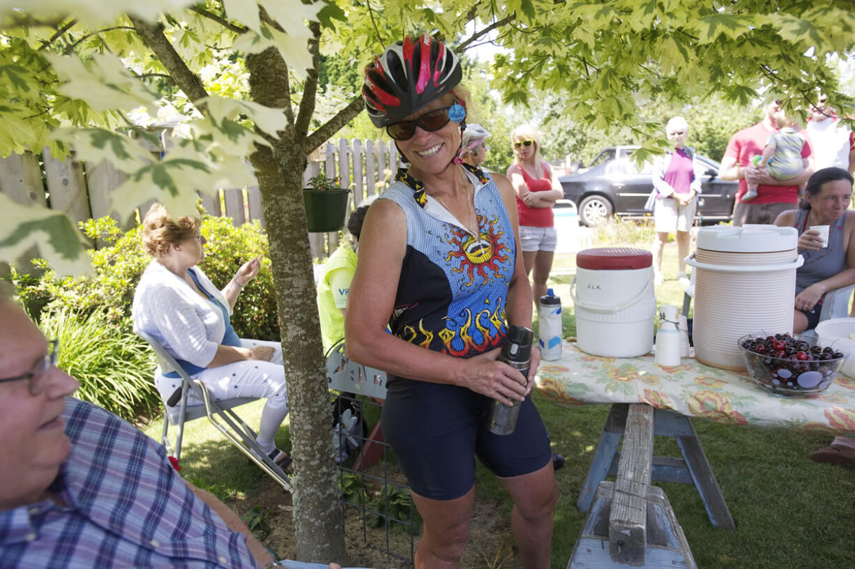 Vancouver cyclist Cindi Rauch returns home after riding 49 century (100 mile) bike rides in 49 states in 49 days, Monday, July 9, 2012.