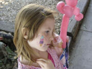 Esther Short: Former Open House Ministries resident Tai Hall, 6, had her face painted at the family shelteris car show and block party on Aug. 25.