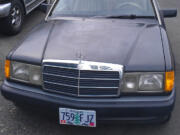 Debbie Peterson's 1990 Mercedes has Oregon license plates because she has yet to replace them with the Washington plates she received in January.