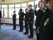 Eight new Vancouver Police officers are sworn in during a July 25 ceremony at the Water Resources Center.