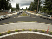 Motorists navigate their way around a new roundabout on Sept.