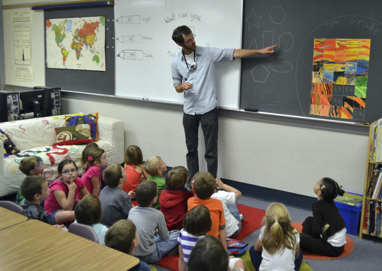 Ridgefield: Kindergartners at Union Ridge Elementary School review basic shapes in Alan Adams' art class during National Arts In Education Week.