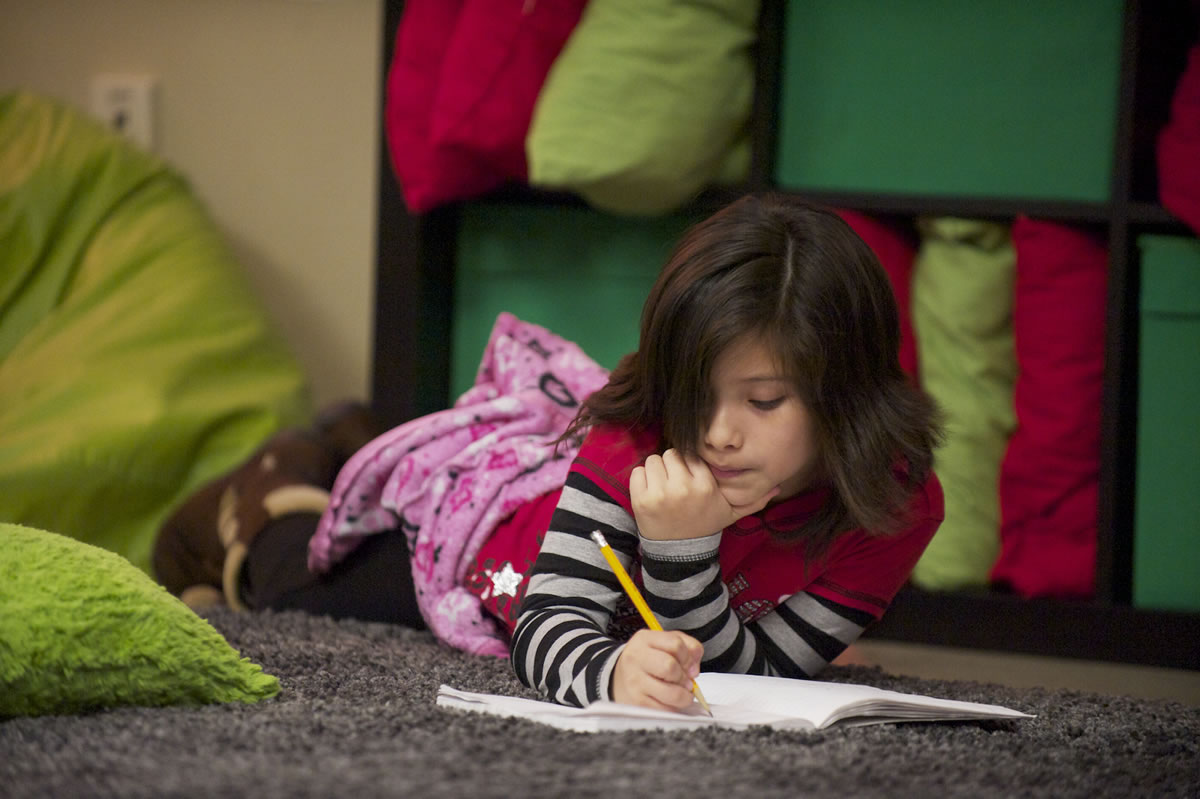 Photos by Steven Lane/The Columbian
Crestline Elementary third-grader Brissa Campos, 9, works on free writing in her new classroom at Riverview Elementary.