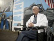 Hal Berven recalls being aboard the Vancouver-built USS Gambier Bay when it was sunk during the Battle of Leyte Gulf in 1944. The mural at the left shows the sinking of the USS St. Lo (which was launched on Aug.