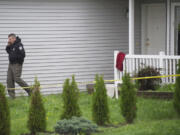 Clark County sheriff's detectives investigate the scene of a fatal stabbing, which was reported just after 4 a.m. on Saturday at 8707 N.E. 89th Ave.